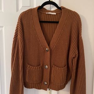 Brown, knit sweater. Great condition. Oversized, and a little cropped.